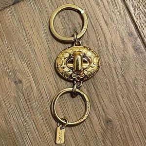 Coach Signature Turnlock Keychain